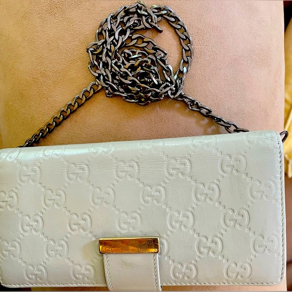 Gucci Handbags - Gucci cream gray leather long bifold wallet w gold tone hardware with front snap